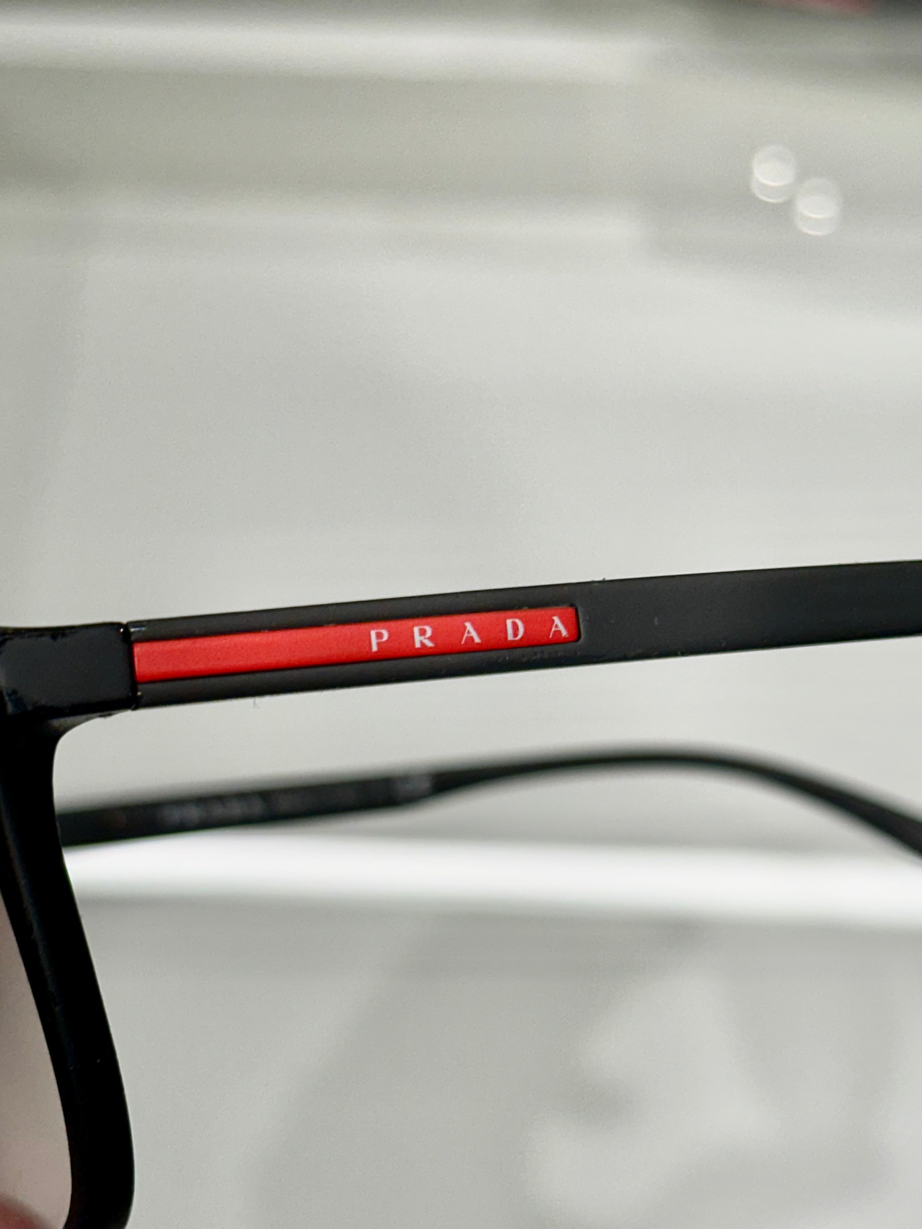 Óculos Prada