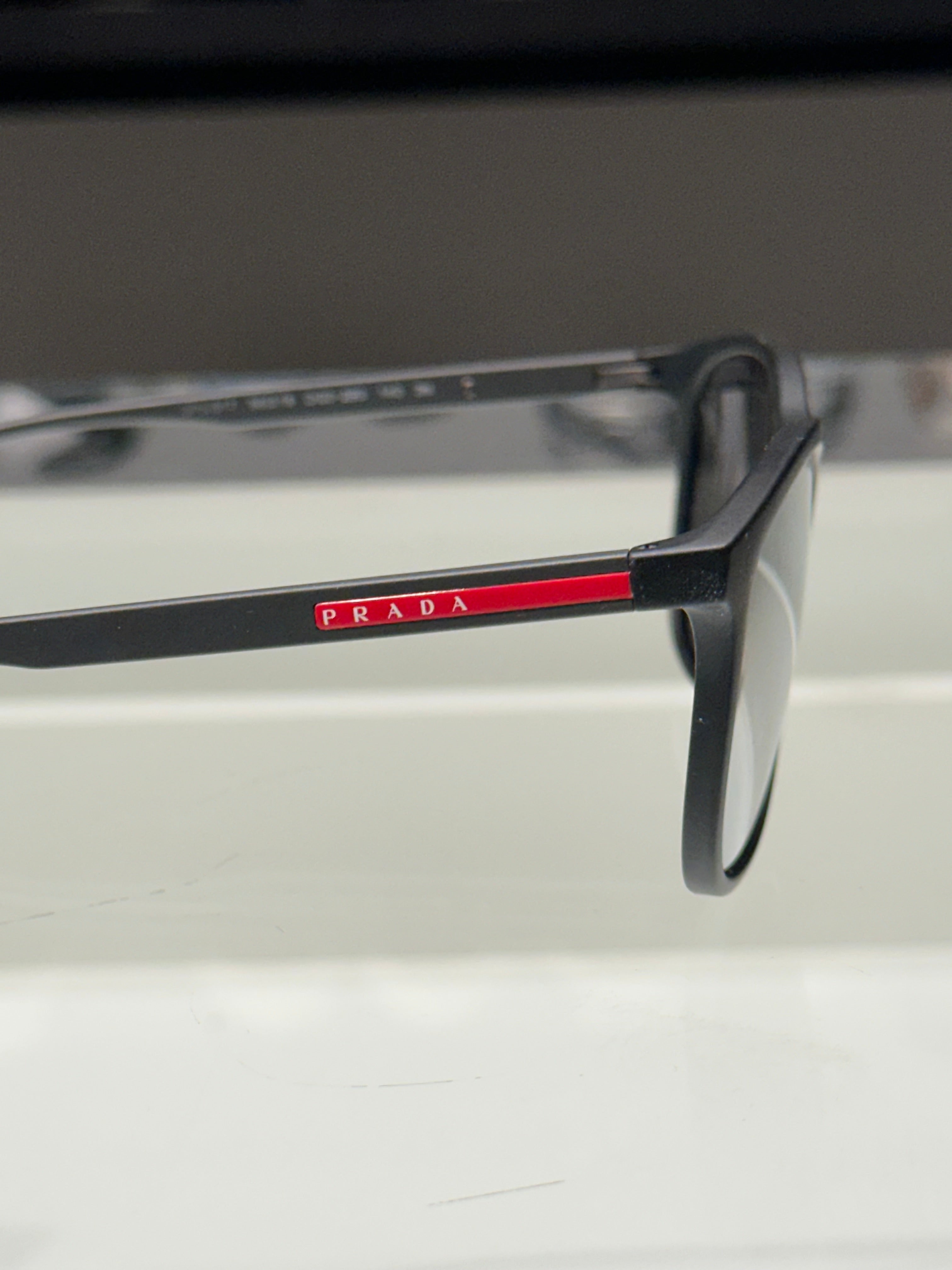 Óculos Prada