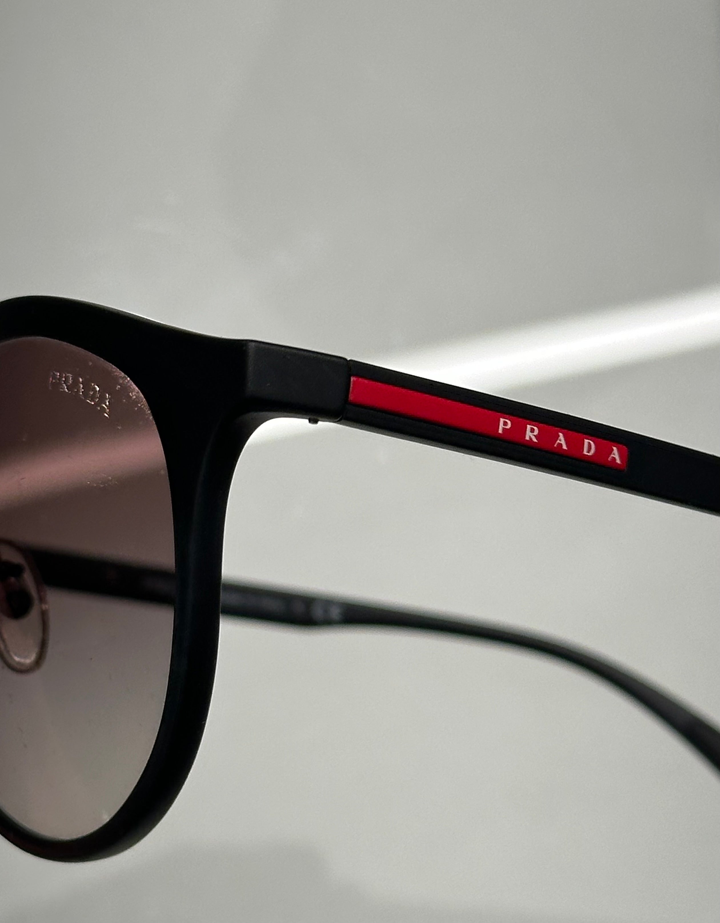 Óculos Prada