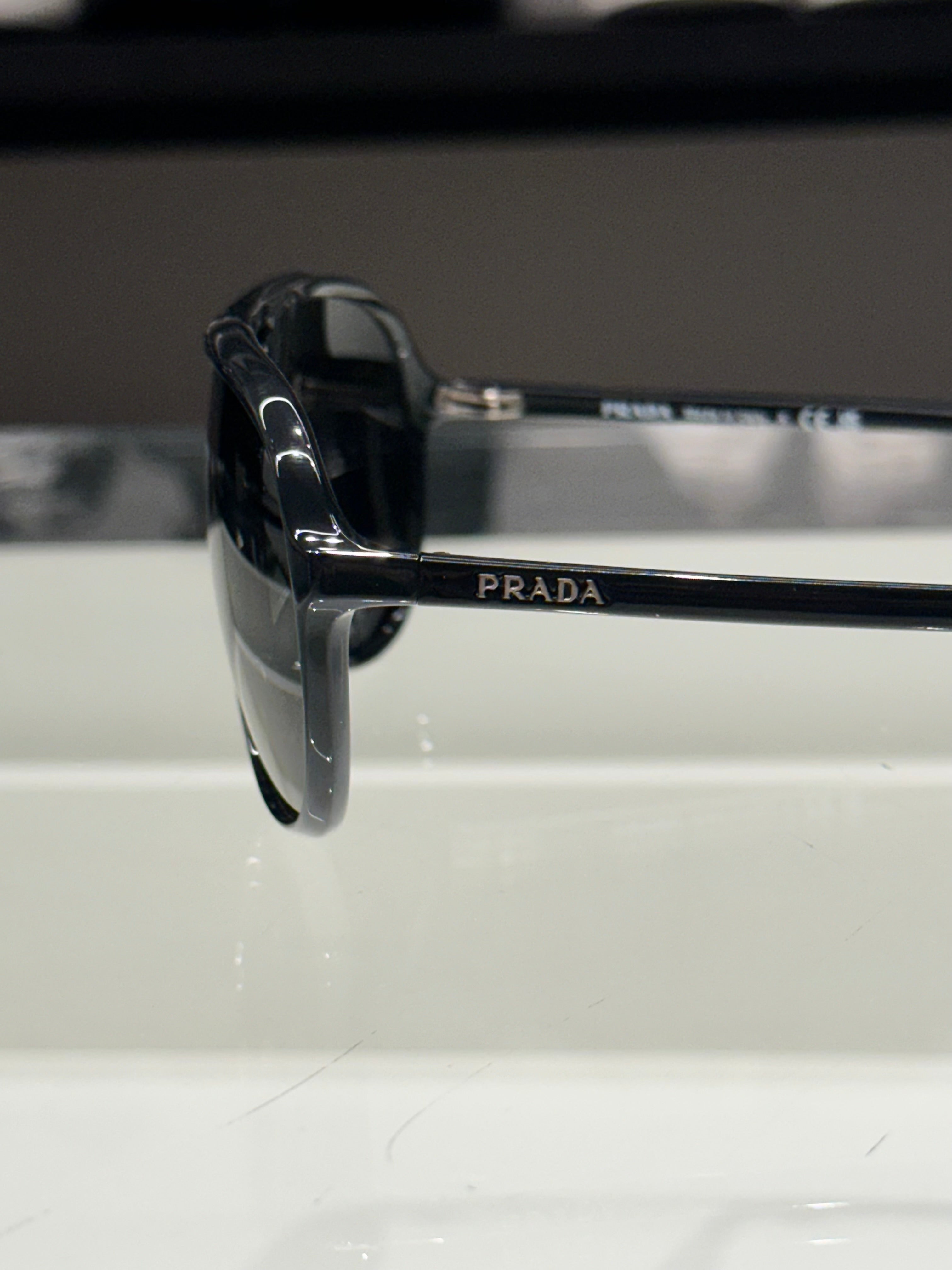 Óculos Prada