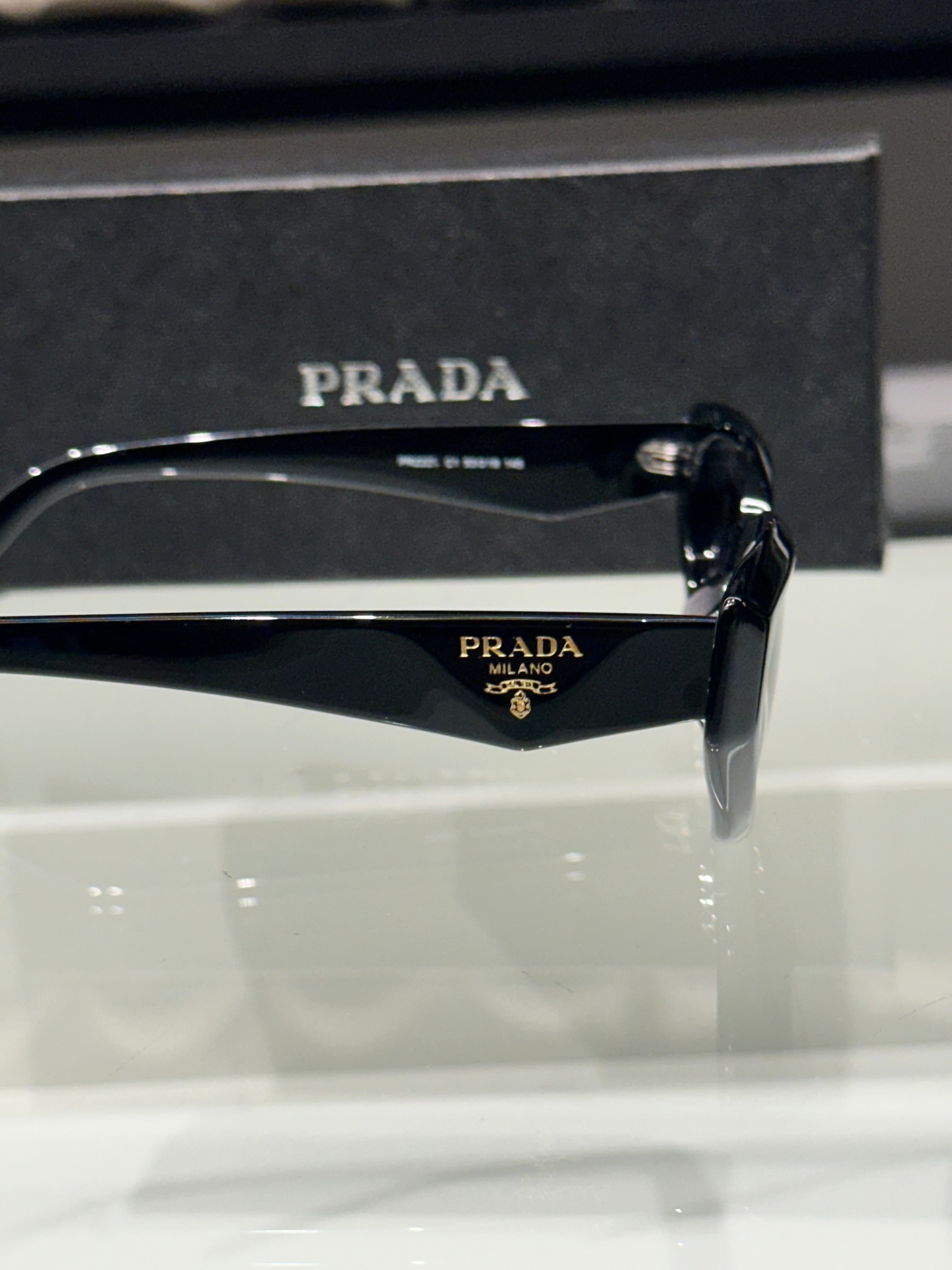 Óculos Prada